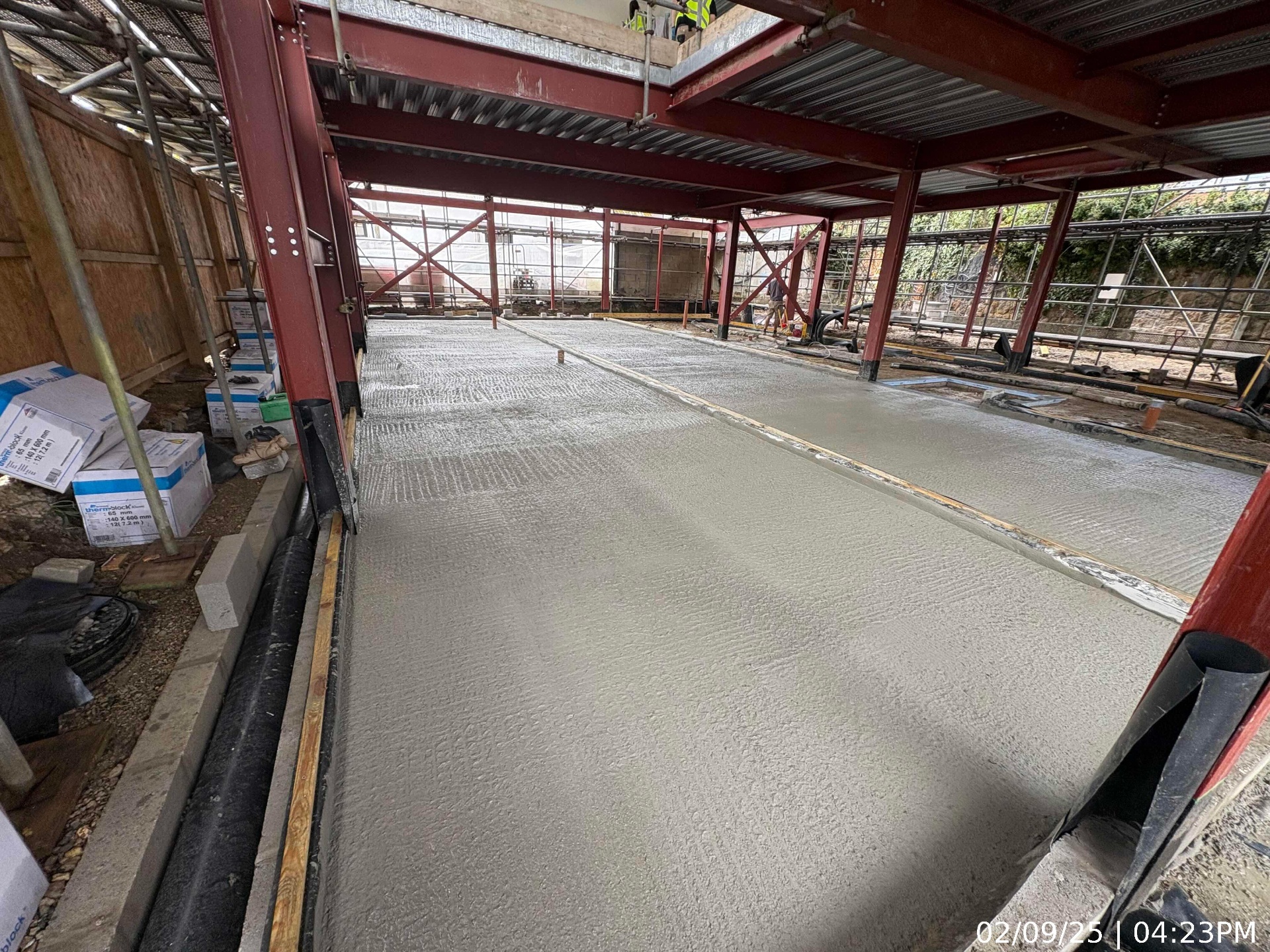 Power-floated reinforced concrete first-floor slab inside the steel-framed Newlyn Skills Centre